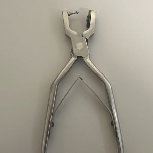 Perfurador de dique de borracha